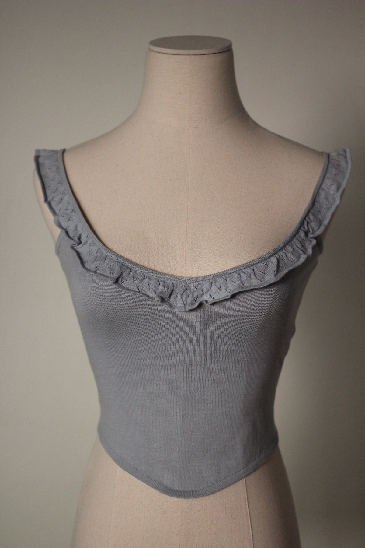 Front view of the gray Chloe by Stella McCartney S/S 1999 ruffled knit tank top with a scoop neckline