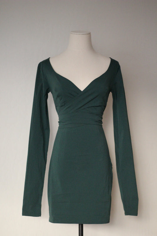 Dark green long-sleeve vintage wrap mini dress with a deep V-neckline and fitted waist, displayed on a mannequin