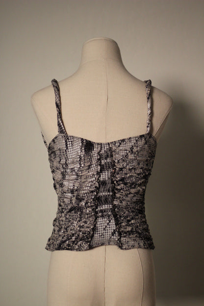 Back view of the Roberto Cavalli Fall/Winter 2003 reflective snake print top featuring thin twisted shoulder straps, a straight neckline, and ruched detailing throughout the bodice.