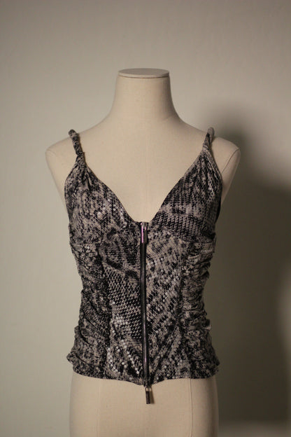 Front view of the Roberto Cavalli Fall/Winter 2003 reflective snake print top featuring a plunging V-neckline, thin straps, ruched sides, and a front zipper closure.